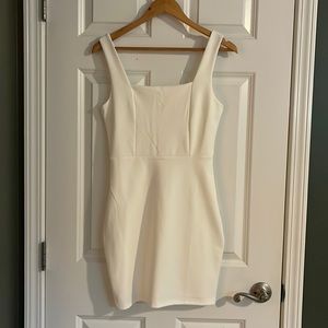 White mini dress Pink Lily. Never worn.